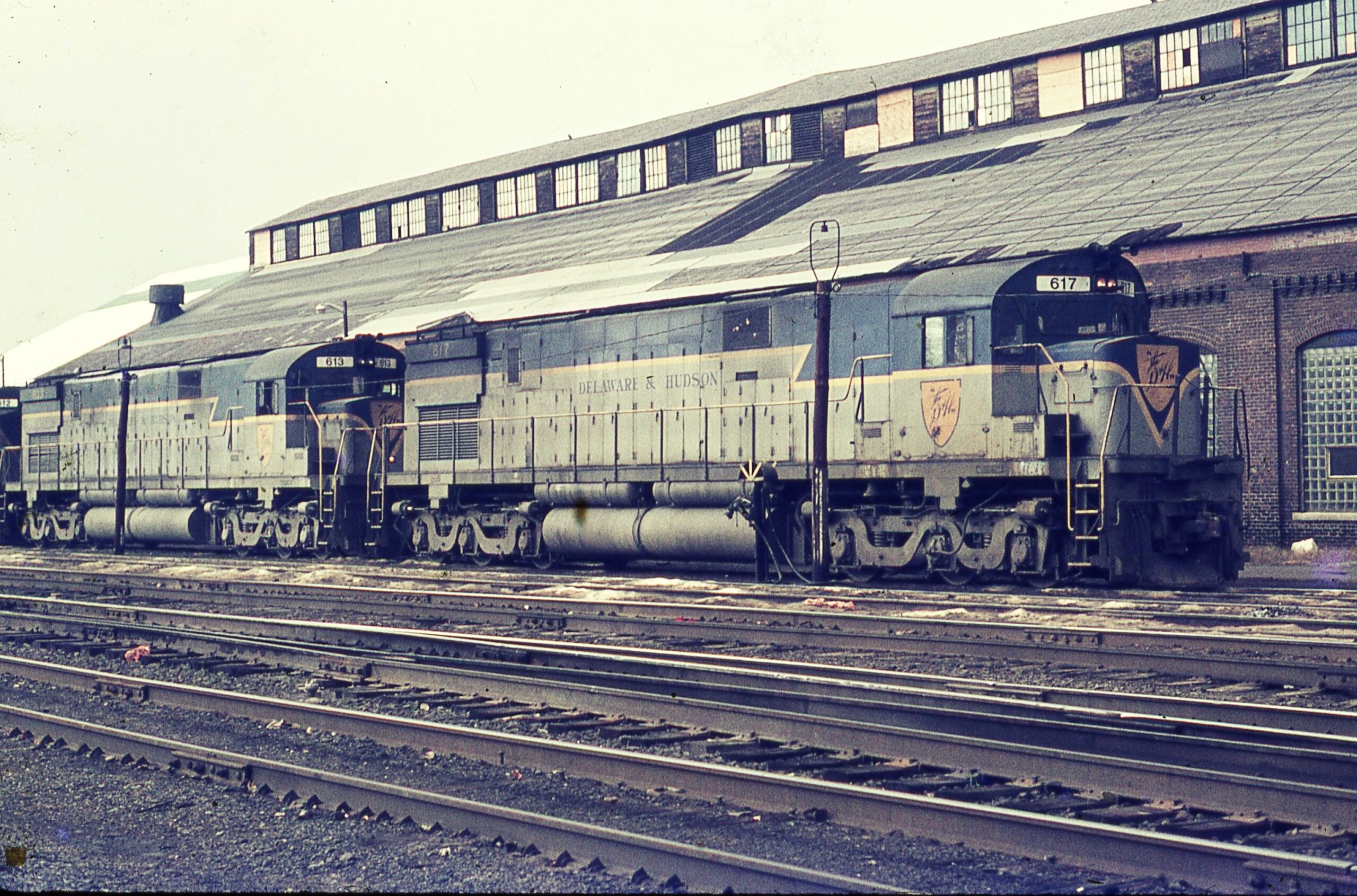 Delaware and Hudson | Oneonta, New York | Alco C628 617 and 613 | Shop building | October 1974 | Larry Steingarten