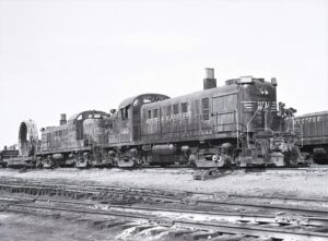 Western Maryland Railway | Hagerstown, Maryland | Alco RS3 189 and 188 diesel-electric locomotives | with special depressed flat car | March 23, 1974