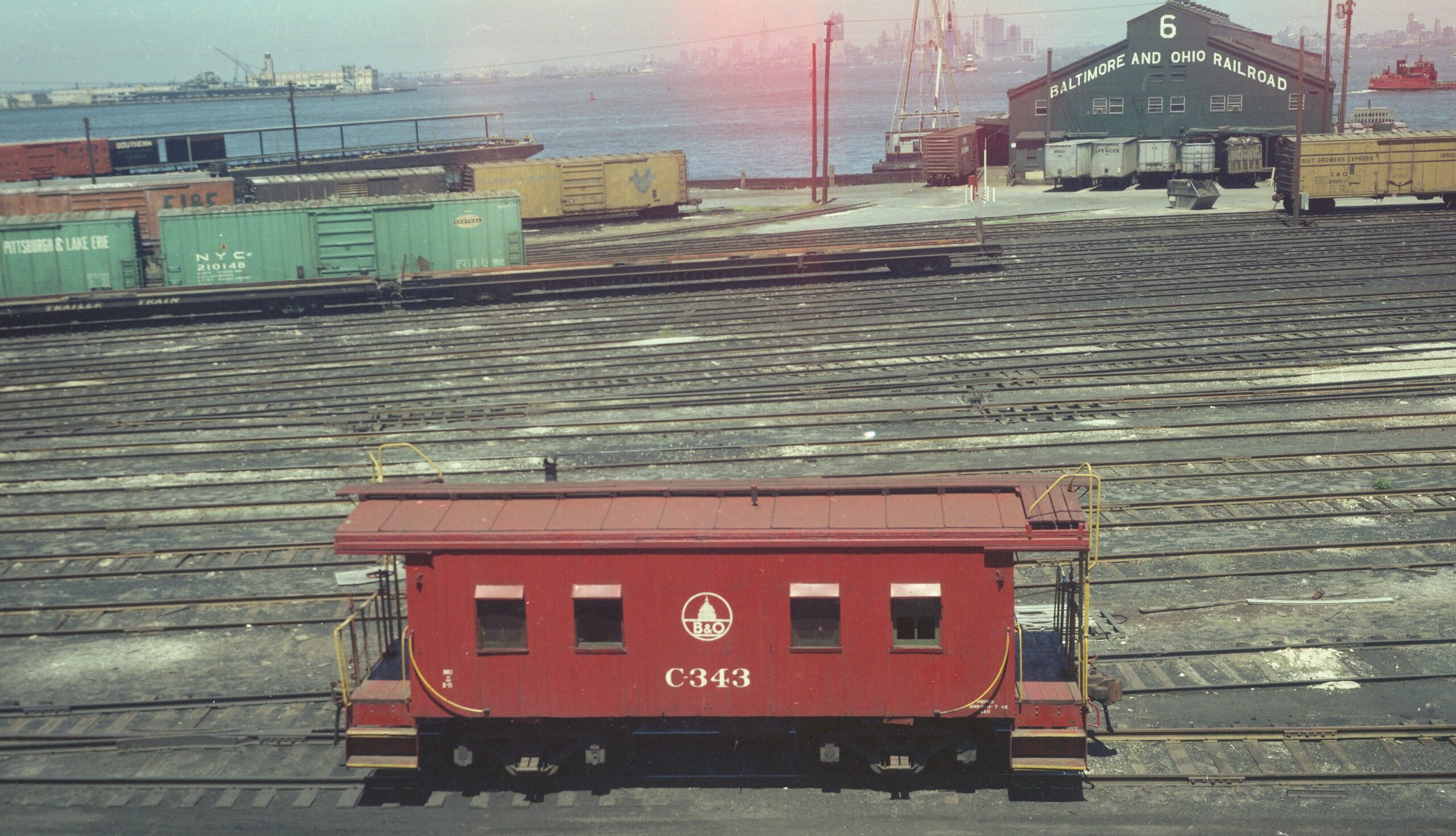 Baltimore and Ohio | Staten Island, New York | I-1 class wooden caboose #C-343 | B&O Pier 6 | Car Float | April 1955 | St. George Yard