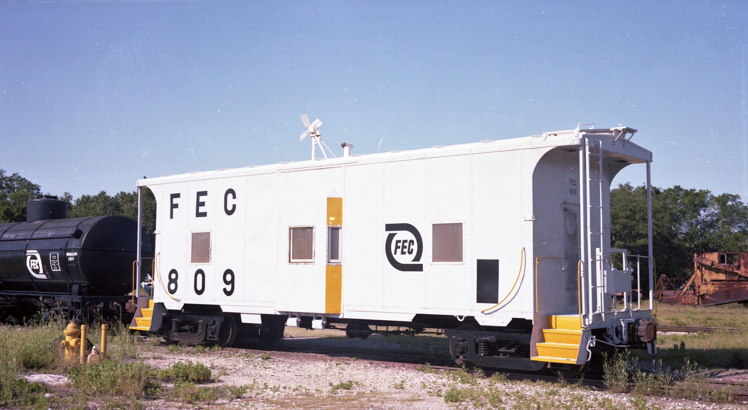 Florida East Coast Railway | New Smyrna Beach, Florida | Bay window caboose #809 | May 26, 1979