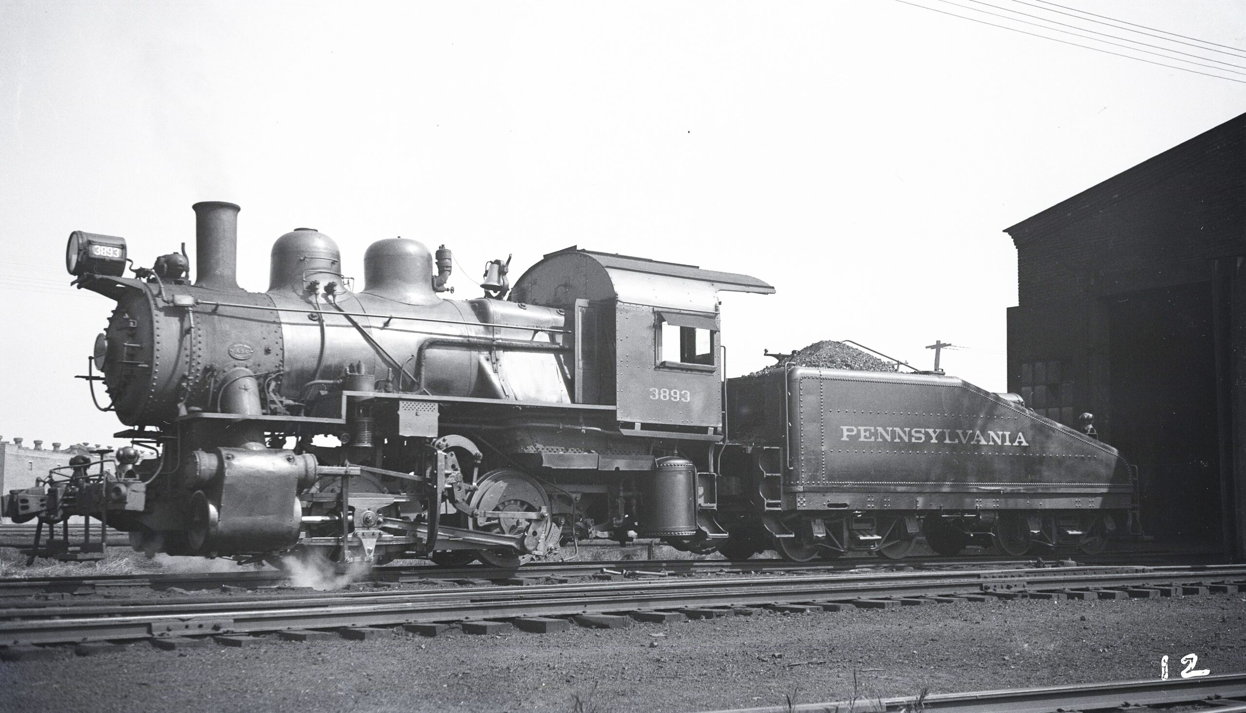 Pennsylvania Railroad | Lancaster, Pennsylvania | Class A-5s 0-4-0 #3893 steam locomotive | Engine House | September 30, 1933 | John Bowman photo