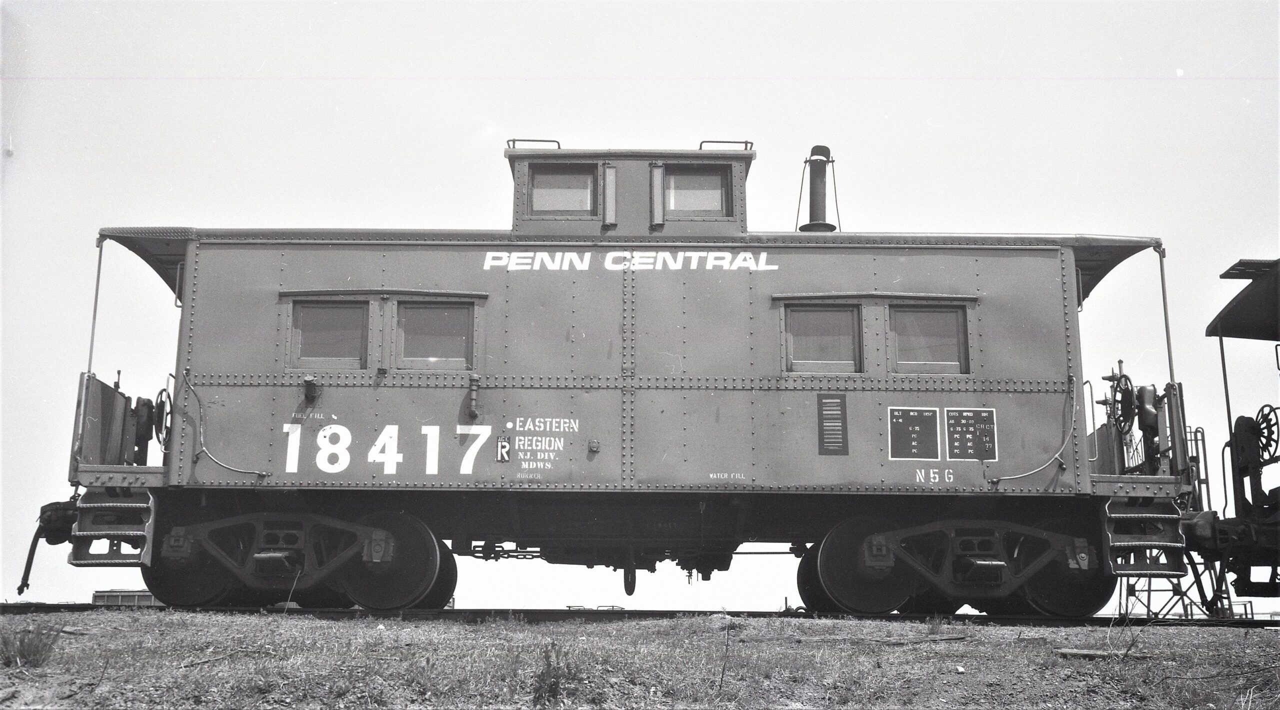 Penn Central | Elizabethport, N.J. | Class N5-G caboose 18417 | May 17, 1977 | H B Osborne photo