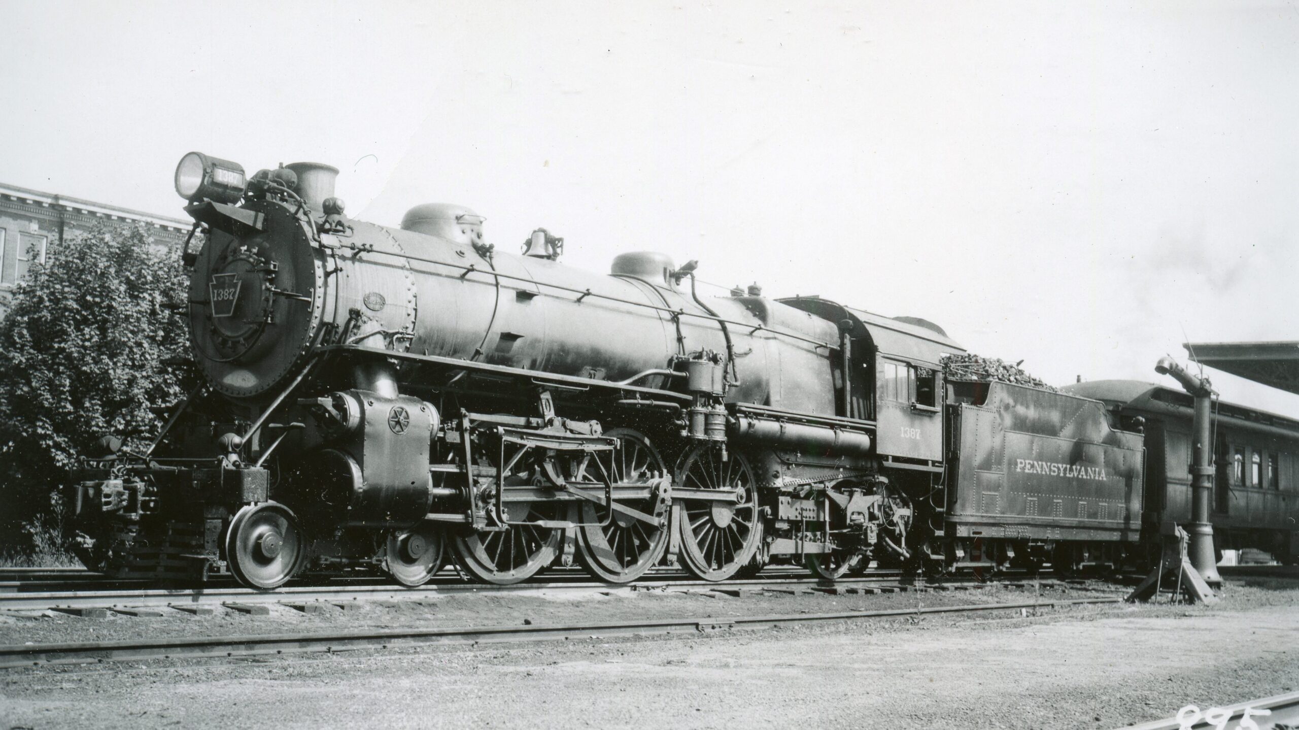 Pennsylvania Railroad | Chambersburg, Pennsylvania | Class K2sa 4-6-2 #1387 steam locomotive | Station | Water plug | June 16, 1940 | John Bowman, Jr. photpgraph