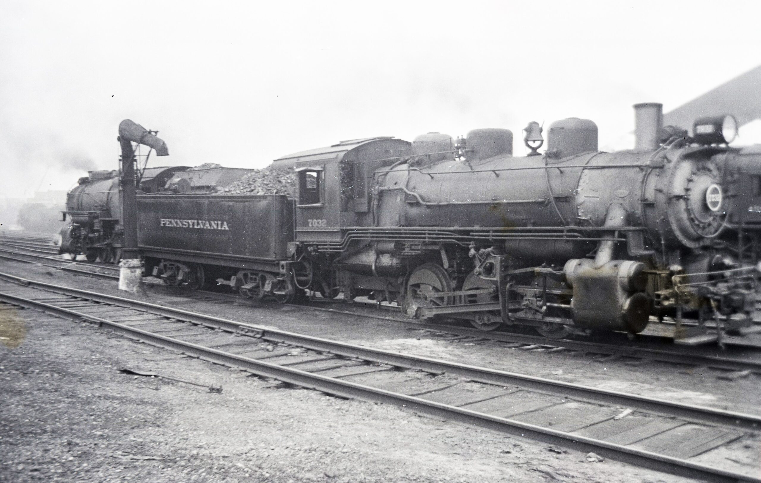 Pennsylvania Railroad | Cleveland, Ohio | class B23s 0-6-0 #7032 steam locomotive | Water plug | August 1941 | Fielding Lew Bowman photograph