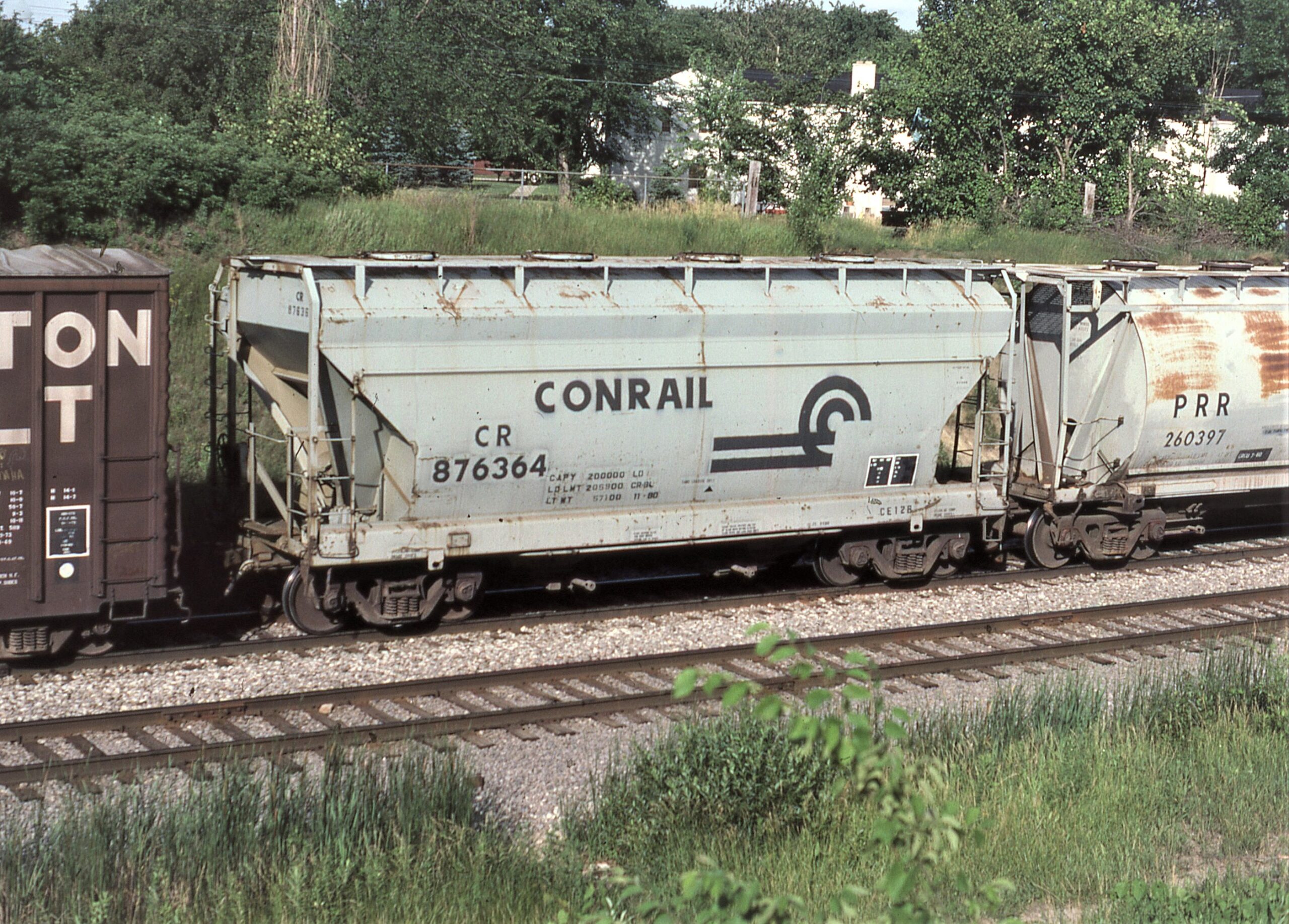 Conrail | Birmingham, Michigan | ACF 2-Bay Class CE12B Covered Hopper 876364 | August 1984 | Emery Gulash Photograph