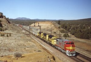 Atchison Topeka and Santa Fe Railway | Eagles Nest, Arizona | GE C40-8W 890 + EMD SD45u 5450 + 2 diesel-electric locomotives | Intermodal stack train eb | February 10, 1995 | Dave Rector Photo