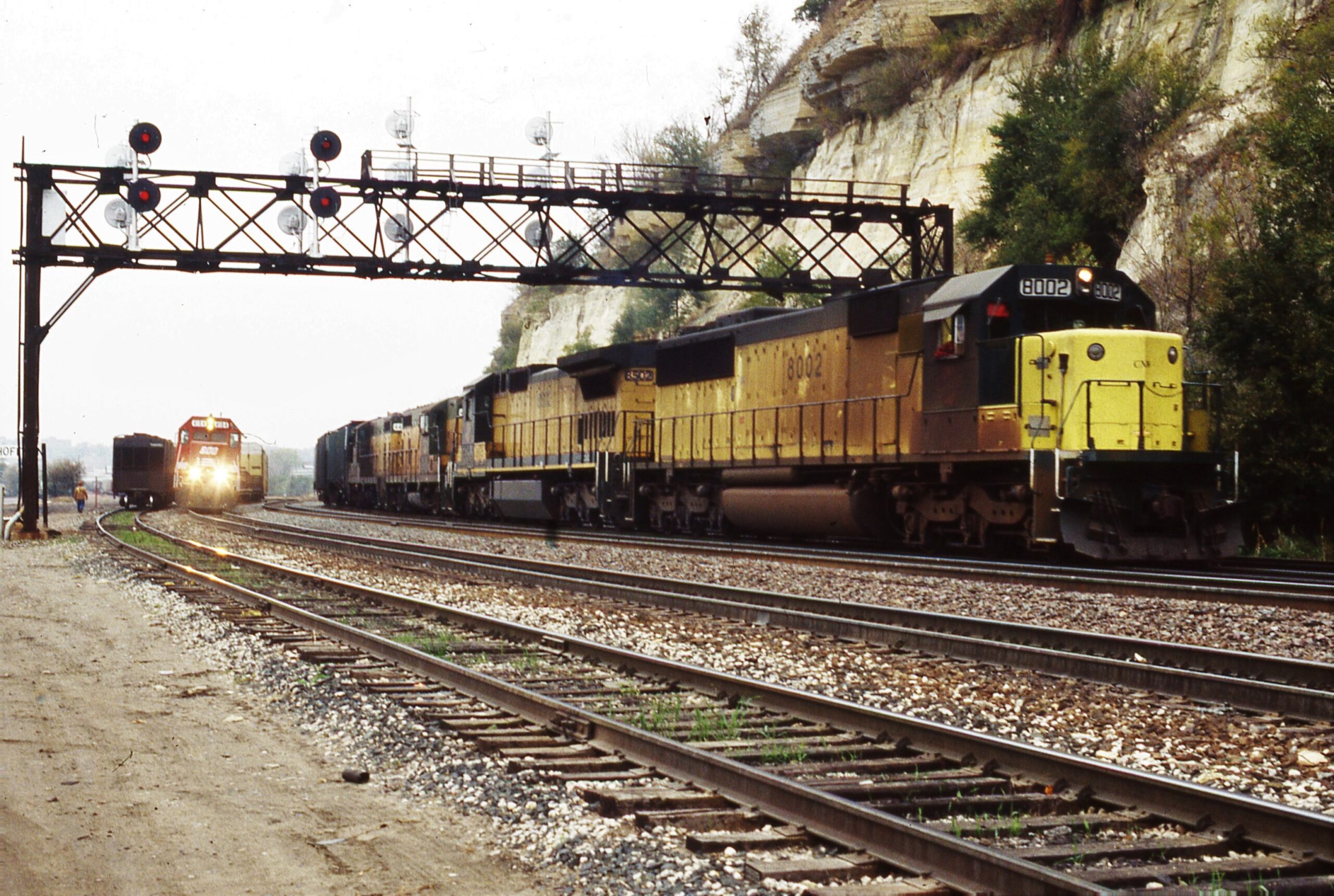 Chicago and Northwestern | Saint Paul, Mn. | EMD SD60 8002 + 3 diesel-electric locomotives | eastbound freight | Hoffmans | October 20, 1992 | Dick Flock photograph