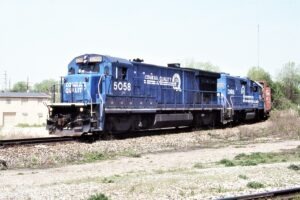 Conrail | Columbus, Ohio | GE B36-7 #5058 + EMD GP38-2 #8068 diesel-electric locomotives | Train 18 CSX/NS Transfer | April 24, 1998 | Dick Flock photograph