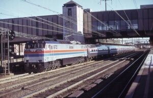 Amtrak | Trenton, New Jersey | GE E60CP #972 electric motor | Passenger train | Trenton, NJ | Amtrak Station | February 1976 | William Rosenberg photograph