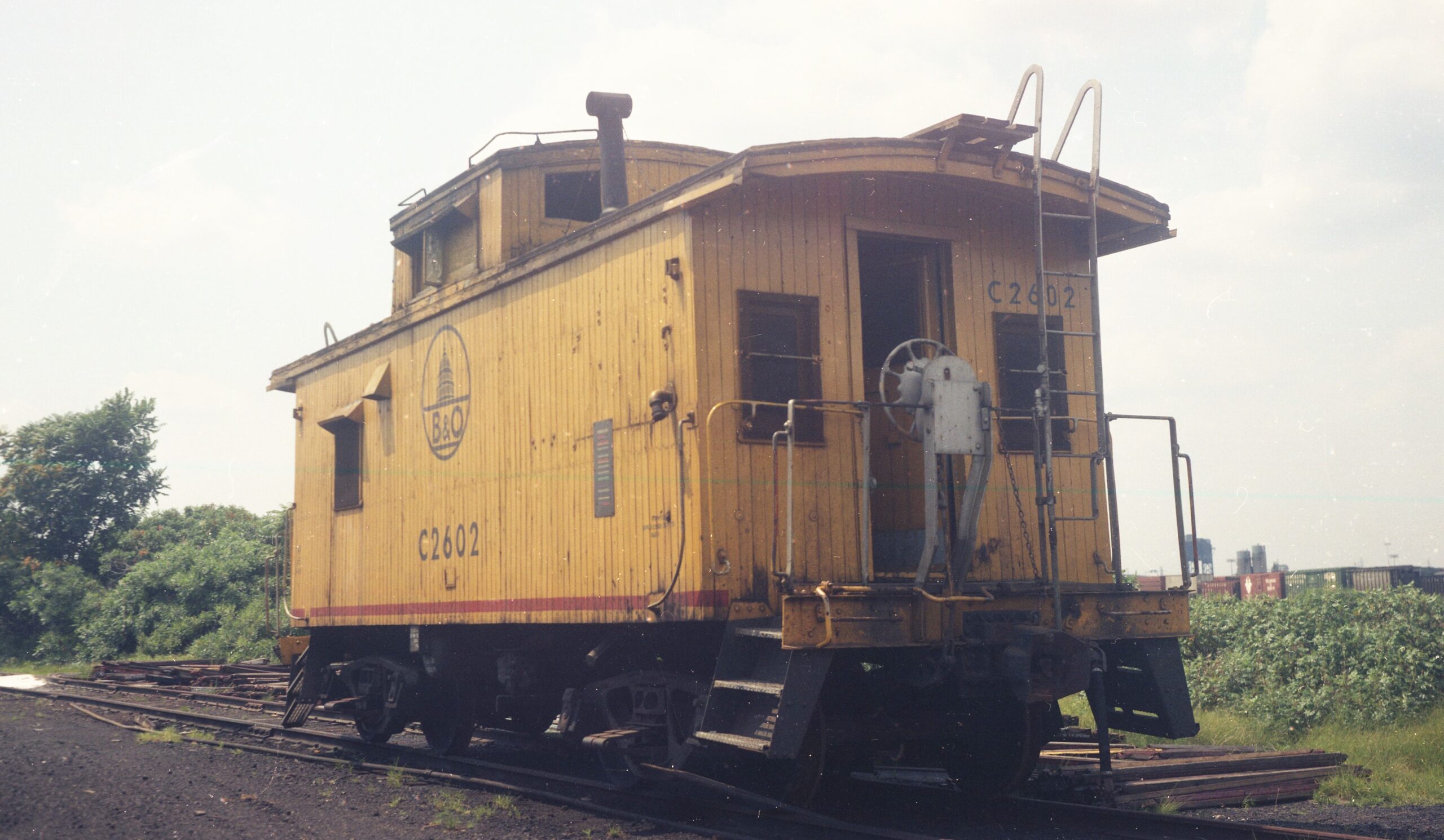 Baltimore and Ohio | Staten Island, New York | Class I-10 wood framed caboose # C2602 | Arlington Yard 25 | July 23, 1973