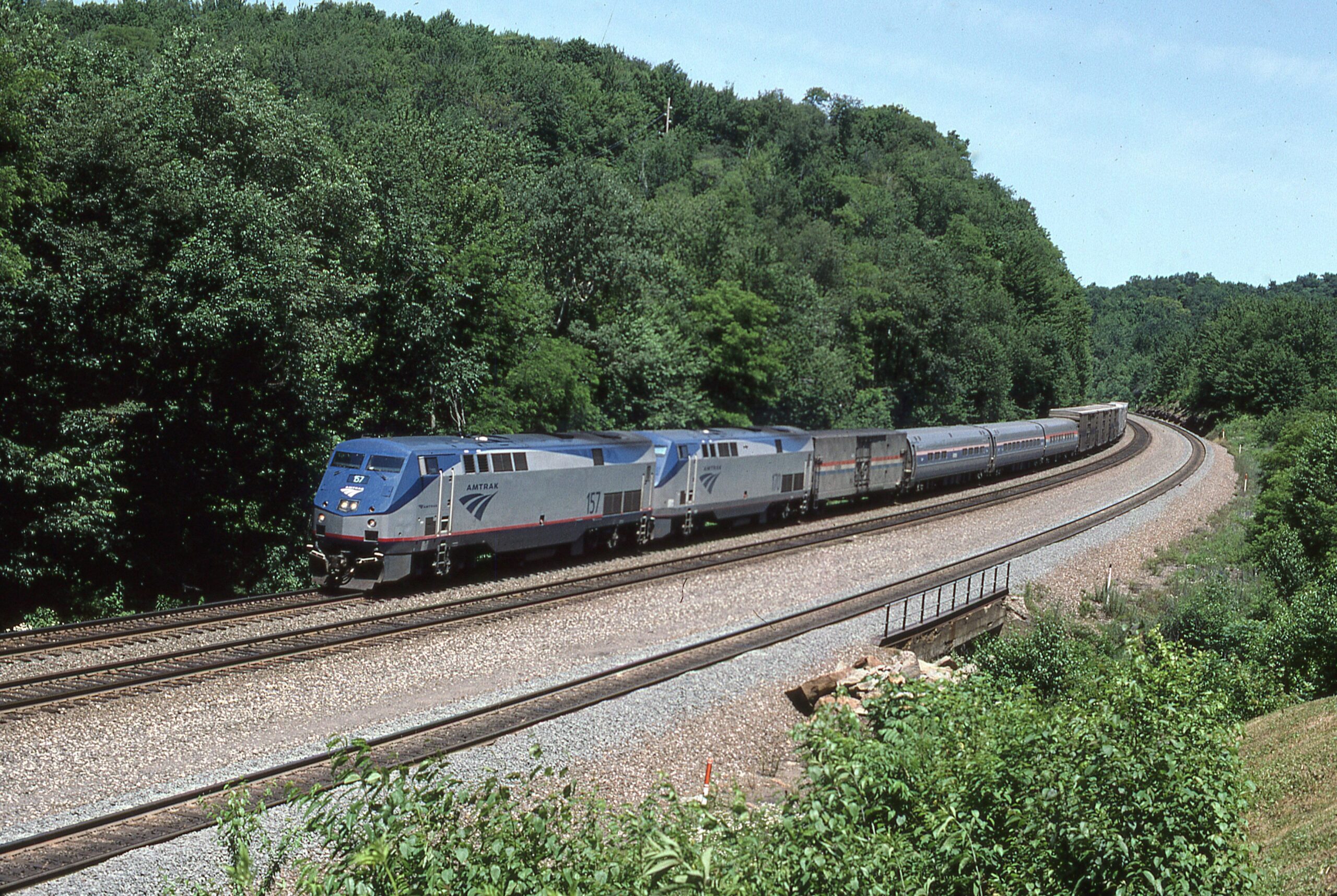 Amtrak | Cassandra, Pennsylvania | D9-P42b 157 and 170 | Pennsylvanian westbound | July 5, 2002 | Dick Flock photograph