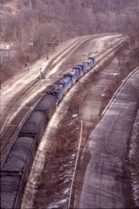 Union Railroad | West Mifflin, Pennsylvania | MP15DC 25 + 4 | northbound Coke Train | February 16, 2002 | Dick Flock photograph