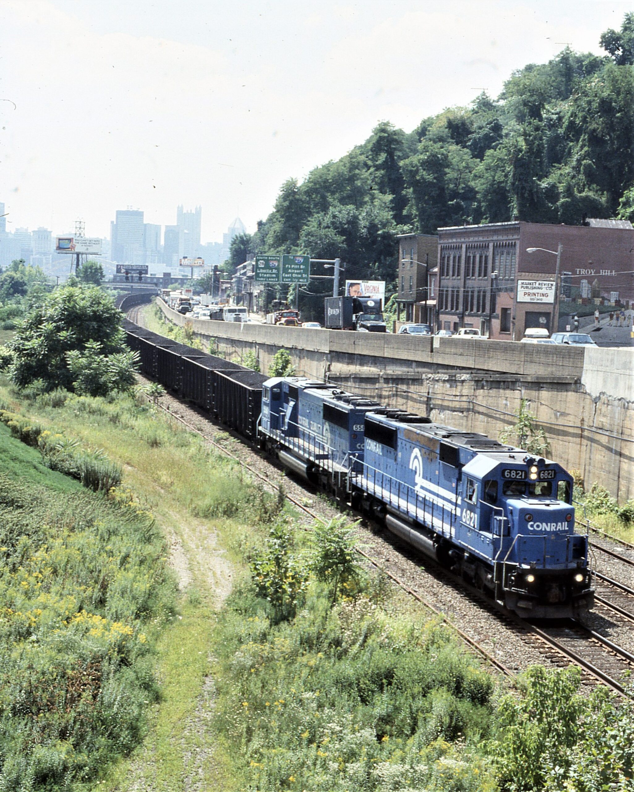 Conrail | Pittsburgh, Pennsylvania | EMD Diesel-electric SD60 #6821 + SD60M #5587 | Coal train | August 26, 1996 | Dick Flock photograph