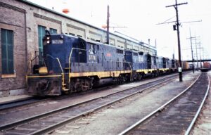 Chicago South Shore and South Bend | Michigan City, Indiana | EMD GP7 #5778 diesel-electric locomotive | freight train | Michigan City Shops | March 1976 | Elmer Kremkow photographo