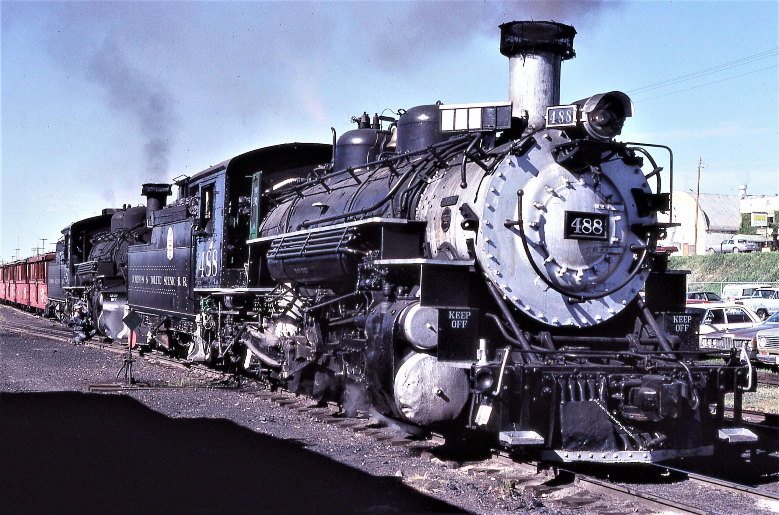 Cumbres and Toltec Scenic Railroad | Chama, New Mexico | 2-8-2 #488 narrow gauge steam locomotive, plus one, and passenger train | June 26, 1979 | Dick Flock photograph
