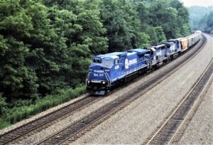 Conrail | Cassandra, Pennsylvania | GE Diesel-electric D8-40CW #6058 + EMD GP40-2 #3327 + GE D8-40CW #6140 diesel-electric locomotives| ATPI | June 29, 1996 | Dick Flock photograph