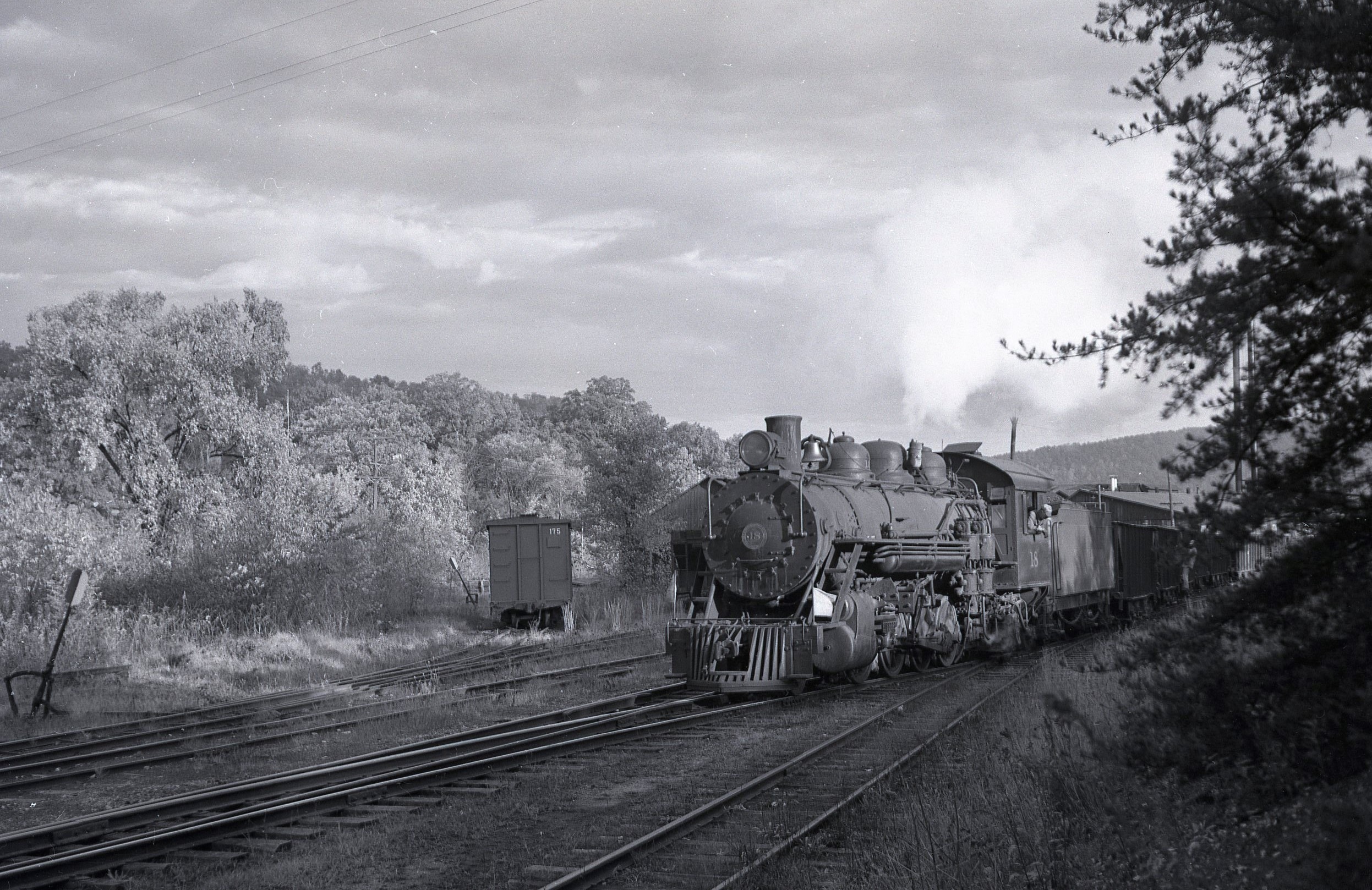 East Broad Top | Orbisonia, Pennsylvania | 2-8-2 #18 narrow gauge steam locomotive | Coal hoppers | October 1954 | Fielding Lew Bowman photograph