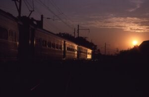 Penn Central Transportation Company | New Brunswick, New Jersey | GE Arrow MU electric set | twilight sunset view | October 1978 | John Hilton photo