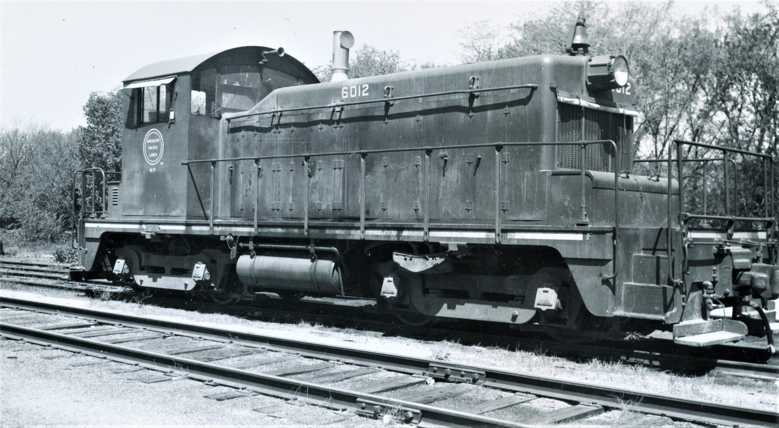 Missouri Pacific | Springfield, Missouri | EMD SW1 #6012 diesel-electric locomotive | May 2, 1965 | Arthur B. Johnson photograph | Elmer Kremkow collection