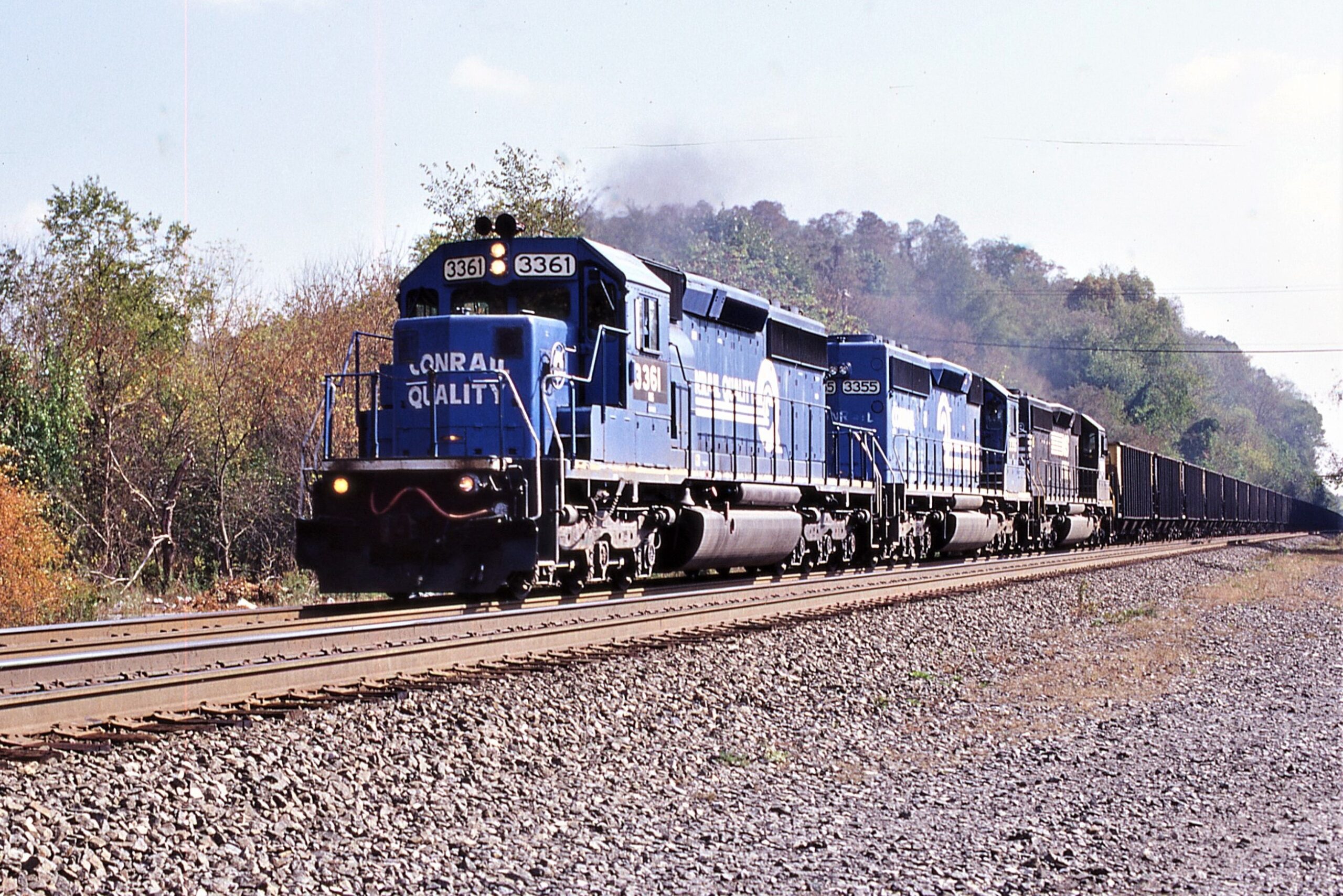 Norfolk Southern | Radebaugh, Pennsylvania | Class EMD SD40-2 3361, 3355, 3379 diesel-electric locomotives | Empty WB PPLX Hopper train | October 15, 2005 | Dick Flock Photograph