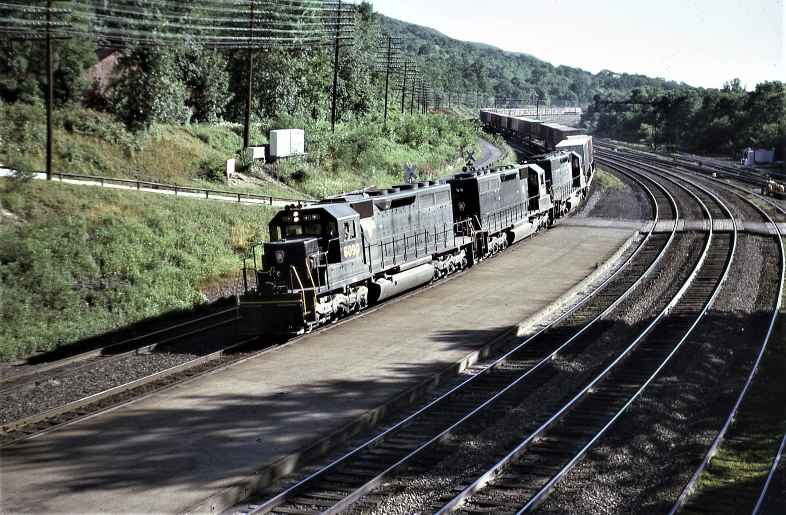 Pennsylvania Railroad | Tyrone, Pennsylvania | EMD Class SD40 #6090 + 2 diesel-electric locomotives | July 16, 1966 | Dick Flock photograph