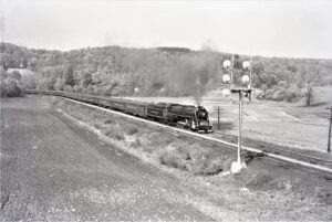 Reading Company | Molino, Pennsylvania | Class T1 4-8-4 #2100 steam locomotive and passenger train | May 1964 | Fielding Lew Bowman photograph