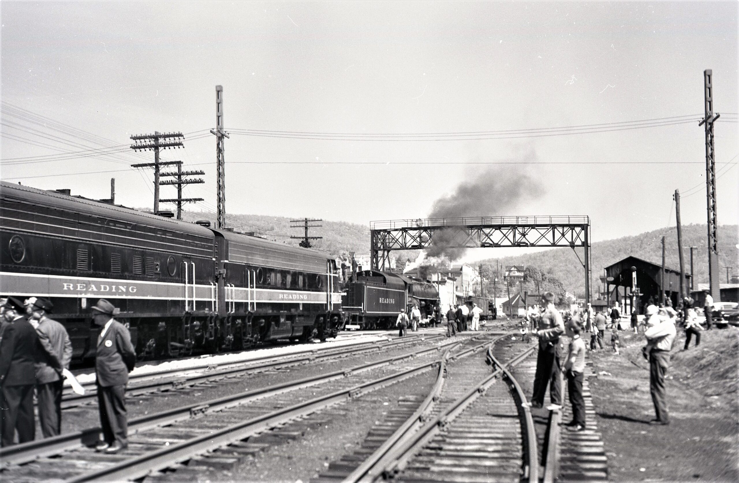 Reading Company | Tamaqua, Pennsylvania | Class T1 4-8-4 #2100 steam locomotive | EMD FP-7 diesel-electric locomotives | crowd watching | May 1964 | Fielding Lew Bowman photograph