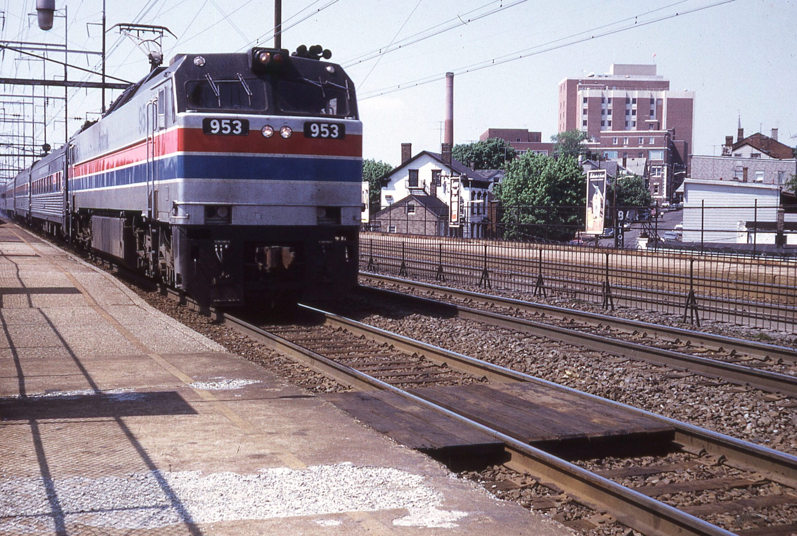 Amtrak | New Brunswick, New Jersey | GE E60CP #953 electric motor | eastbound Clocker | New Brunswick NJ Station | May 1976 | Larry Steingarten photograph