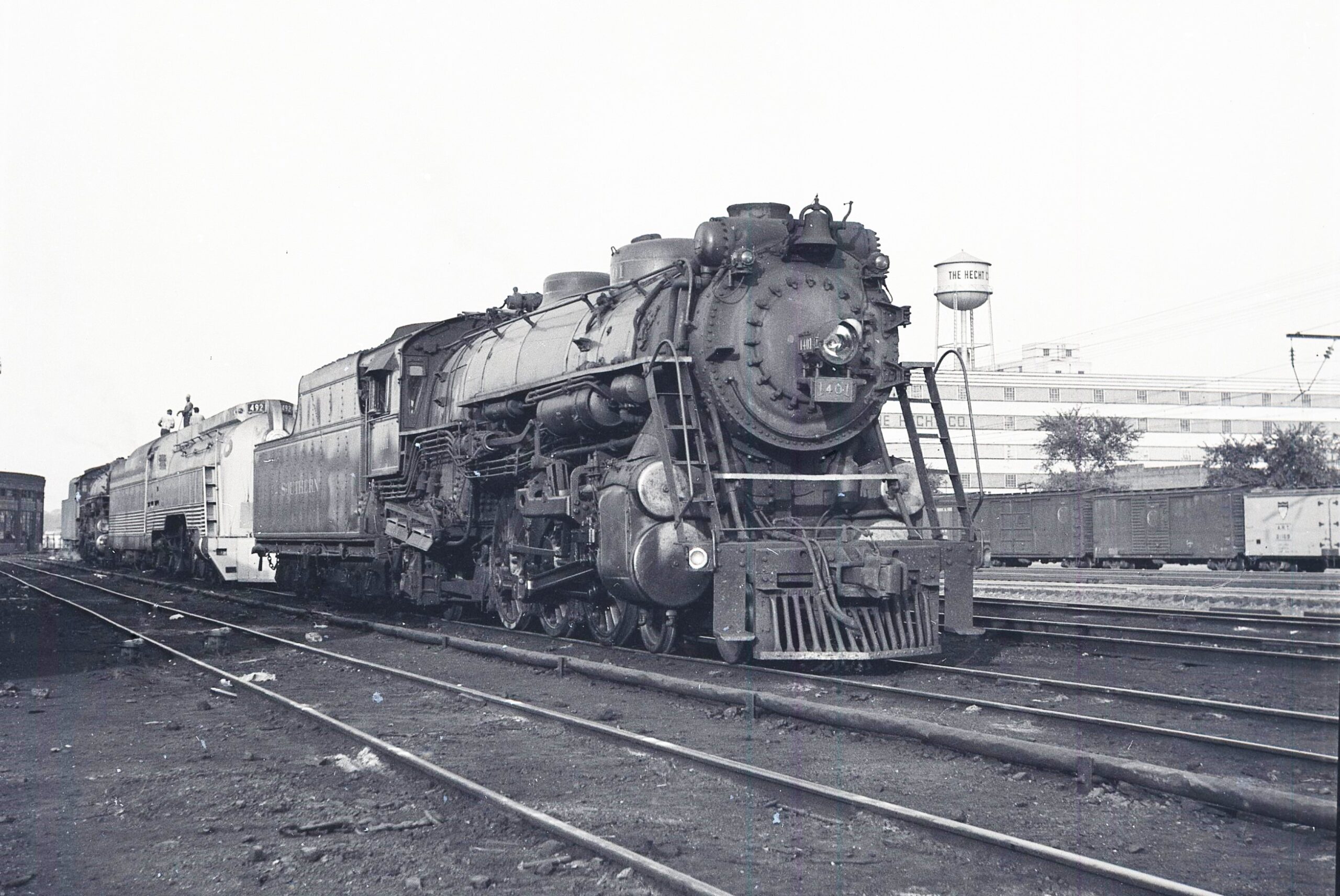 Southern Railway | Washington, D.C. | Ivy City Yard | Class 4-6-2 #1401 steam locomotive | with C&O Streamlined locomotive #492 | October 1950 | Fielding Lew Bowman photograph