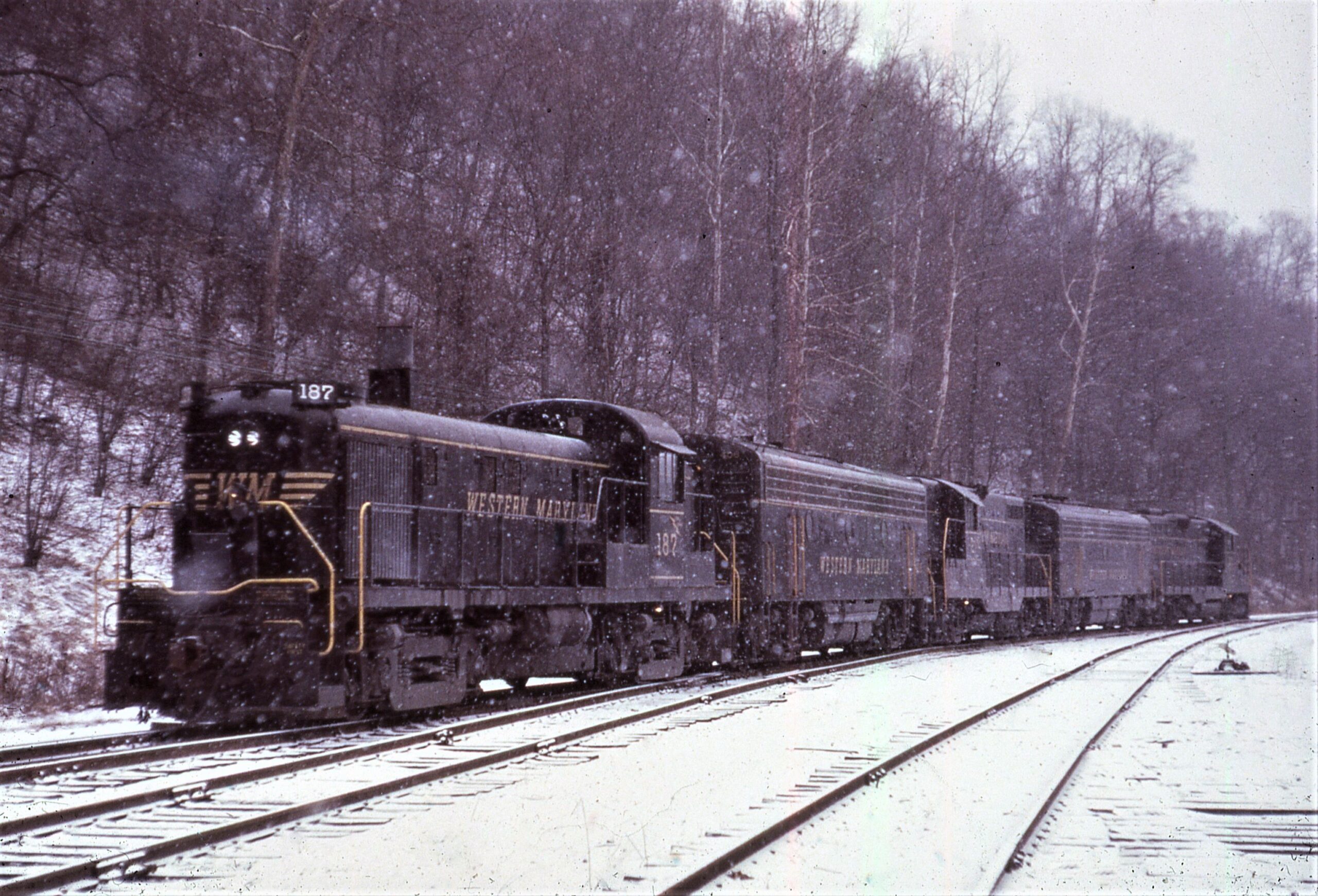 Western Maryland Railway | Dickerson Run, Pennsylvania | Alco Class RS3 #187 + 4 EMD units | February 19, 1966 | Dave Sweetland photograph