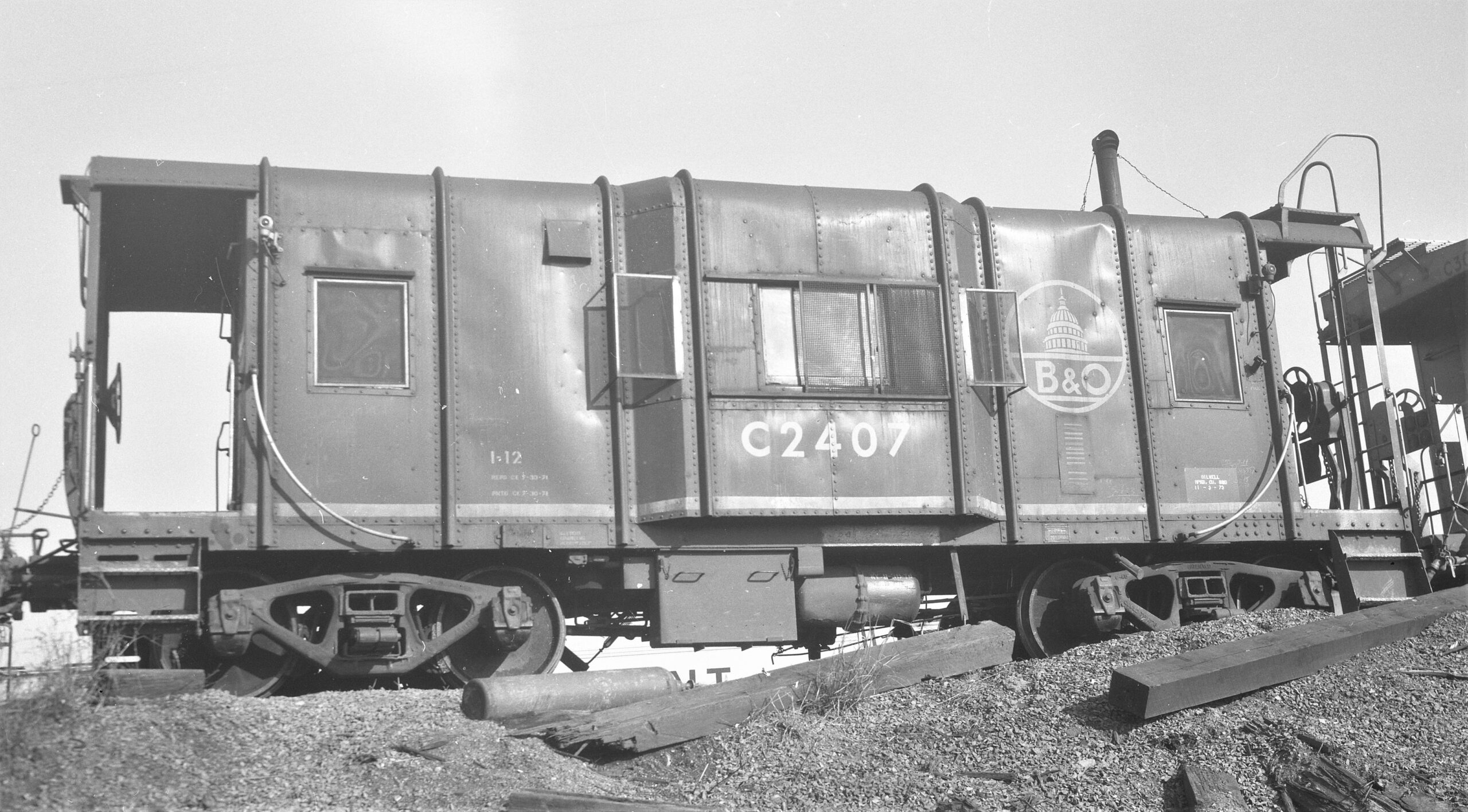 Baltimore and Ohio | Elizabethport, New Jersey | Class I-12 Caboose C-2407 | April 24, 1975 | H.B. Olsen photograph