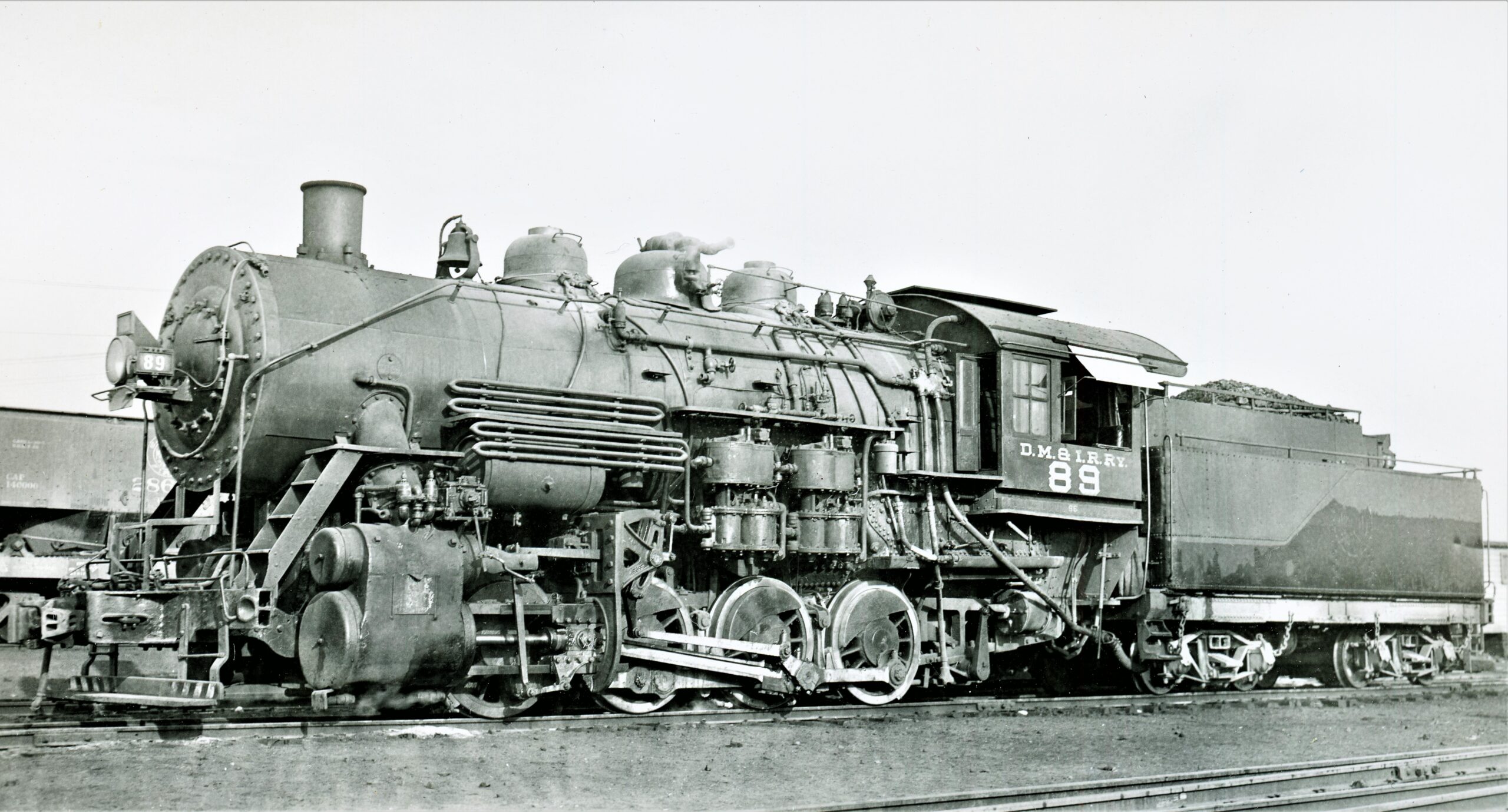 Duluth Missabe and Iron Range Railroad | Proctor, Minnesota | Class 0-8-0 #89 steam locomotive | September 12, 1952 | Robert P. Morris photograph