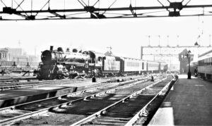 New Haven New York and Hartford Railroad | Boston, Massachusetts | Class 4-6-2 steam locomotive #1317 | Local passenger train | South Street Station | April 1940 | Fielding Lew Bowman photograph