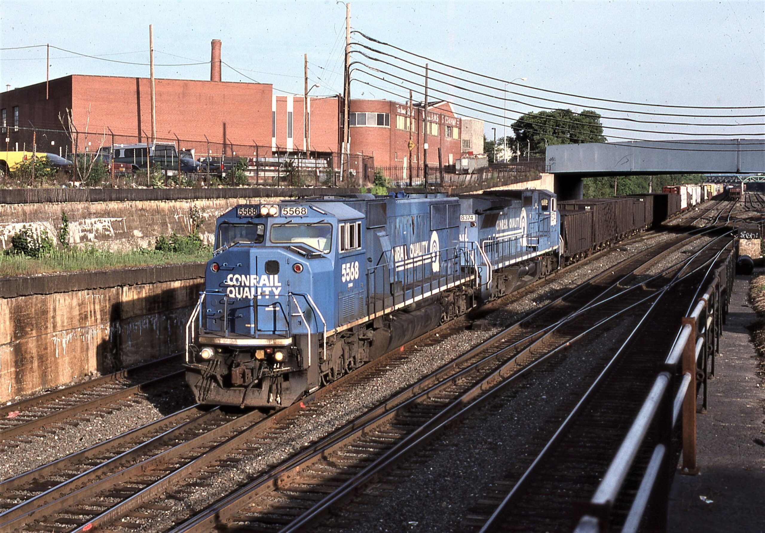 Conrail | Pittsburgh, Pennsylvania | EMD Diesel-electric SD60M #5568 + SD60M #8374 locomotives | freight train | June 4,1999 | Dick Flock photograph