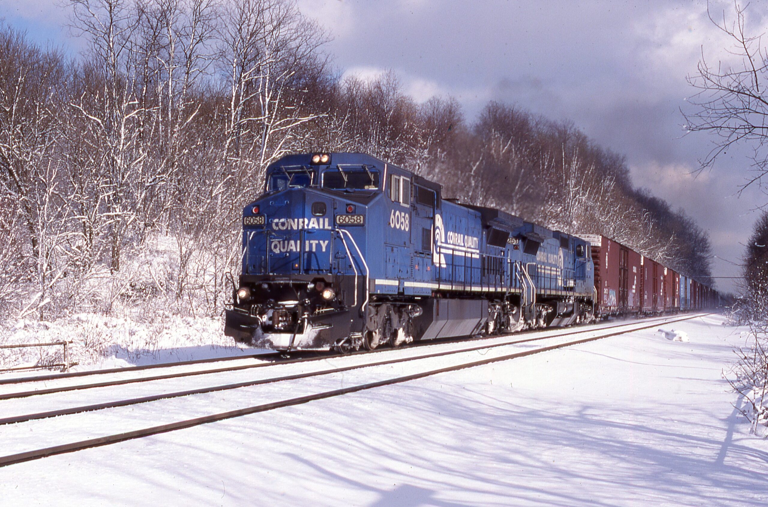 Conrail | Radebaugh, Pennsylvania | GE D40CW #6058 and 6251 diesel-electric locomotives | westbound freight | March 4,1999 | Dick Flock photograph