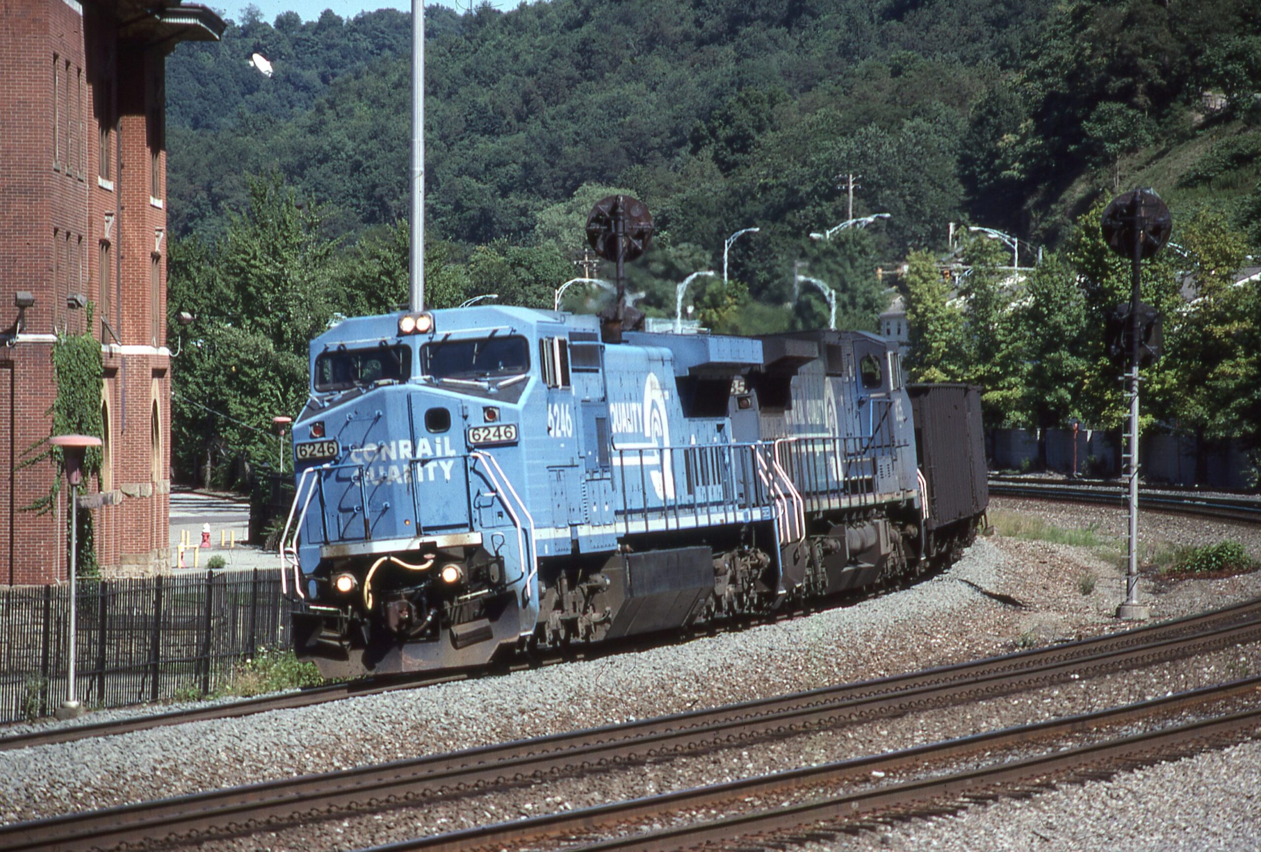Conrail | Wilmerding, Pennsylvania | GE Class D8-40CW #6246 and #6135 diesel-electric locomotives | westbound empty hopper train | August 2, 1998 | Dick Flock photograph