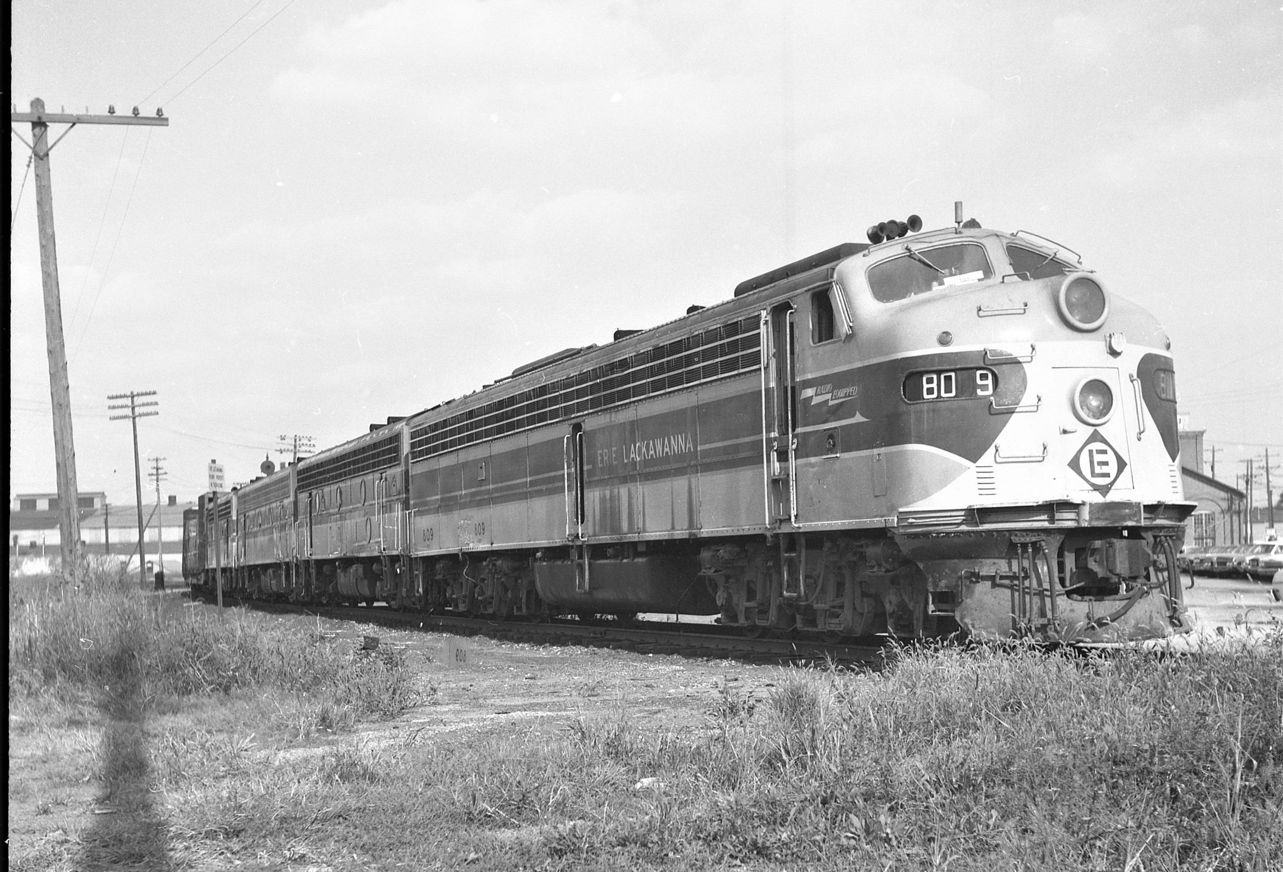 Erie Lackawanna | Marion, Ohio | EMD class E8a #809 + 3 diesel-electric locomotives | freight train | 1967 | Elmer Kremkow photograph
