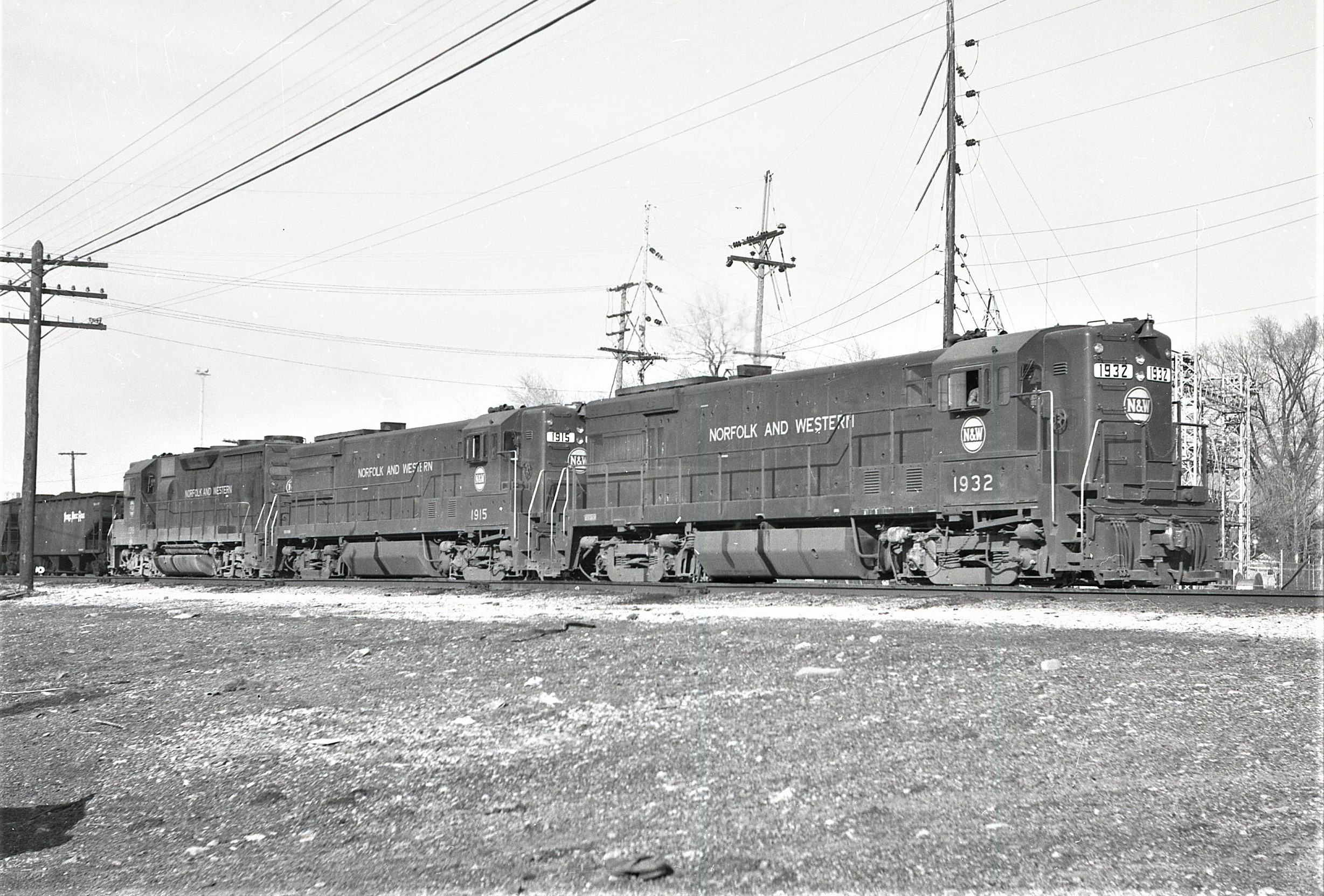 Norfolk and Western Railway | Marion, Ohio | Class GE U30B 1932 and 1915 + one Geep diesel-electric locomotives | plus hopper train | 1967 | Elmer Kremkow photograph