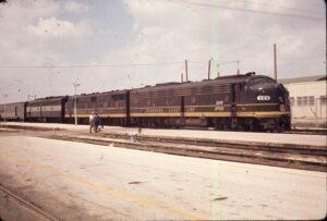 Amtrak | Seaboard Coast Lines | EMD E8a #594 + 2 diesel-electric locomotives | Train 87 Florida Special | April 11, 1972 | Steven Timko collection