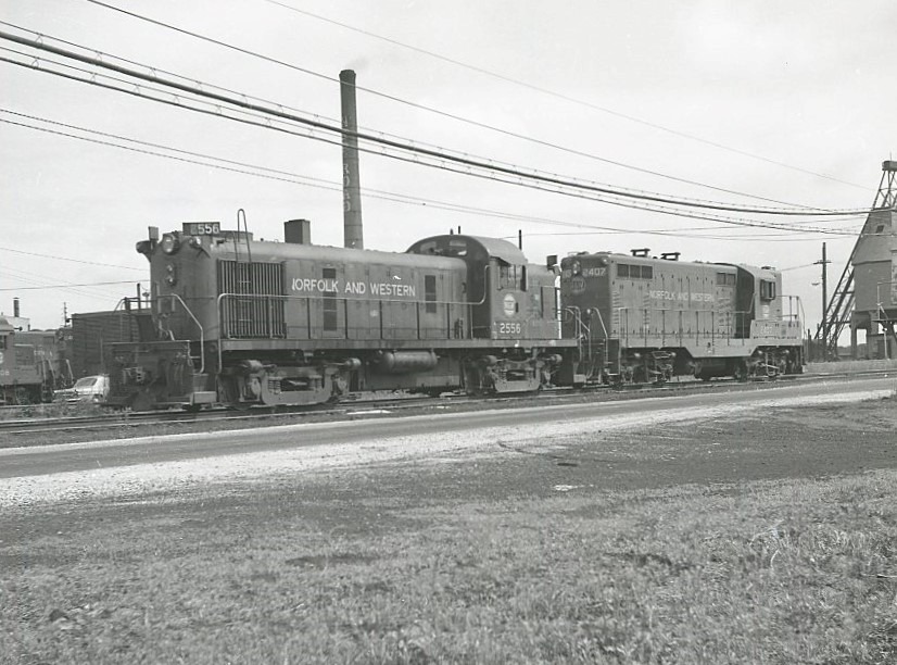 Norfolk and Western Railway | Bellevue, Ohio | Alco Class RS3 # 2556 and EMD GP7 #2407 | 1966 | Elmer Kremkow photograph