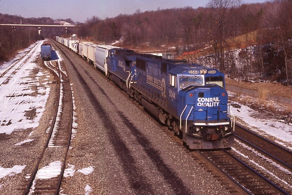 Conrail | Radebaugh, Pennsylvania | EMD SD60M #5544 and GE D8-40CW #5207 diesel-electric locomotives | eastbound | March 11, 1995 | Dick Flock photograph