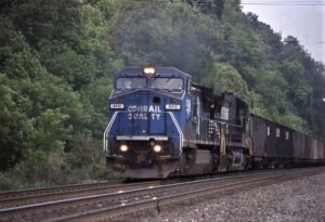 Norfolk Southern | Radebaugh, Pennsylvania | GE D8-40 C #8412 and D9-40C #8838 diesel-electric locomotives | wb Empty Hopper Train | July 9, 1999 | Dick Flock photograph