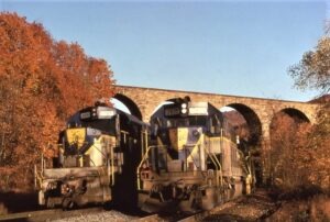 Delaware and Hudson Railway | Lanesboro, Pennsylvania | Alco Class RS3m #5020 diesel-electric locomotive | EMD Class GP39-2 #7611 diesel-electric locomotive | Erie Starrucca Viaduct | October 28, 1978 | Richard Wallin photograph