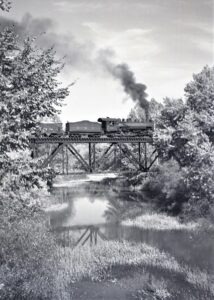East Broad Top | Pogue Trestle, Pa. | between Three Springs and Orbisonia | Class 2-8-2 #18 Mikado steam locomotive plus #15 combine | Pogue Trestle | October 1954 | Fielding Lew Bowman