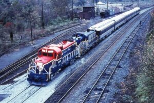 Delaware and Hudson Railway | Birdsboro, Pennsylvania | Class Alco RS3m #1976 + RS3 diesel-electric locomotives | Birdsboro Tower | D&H Inspection Train | November 1976 | Hawk Mountain Chapter, NRHS photograph