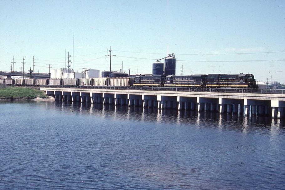 Seaboard Coast Line Railroad | Tampa, Florida | GE U18B #377, U36B #1970, and GE #375 diesel-electric locomotives | Six Mile Creek Bridge | March 30, 1984 | Morning Sun Books collection |