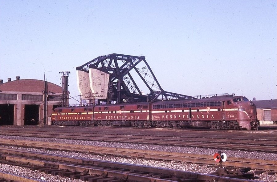 Pennsylvania Railroad | Chicago, Illinois | EMD Class E8a #5896A, E7b #5852b + E7a diesel-electric locomotives | Engine house | September 28,1963 | J.J.Buckley photograph