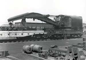 Pennsylvania Railroad | Camden, New Jersey | Crane and boom car #490704 | April 1949 | R. L. Long photograph | WJCNRHS