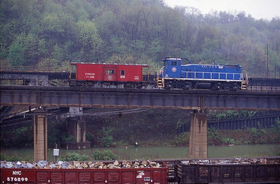 Union Railroad | Braddock, Pennsylvania | EMD MP15 #26 diesel-electric locomotive | Caboose # L-199 | on trestle | April 30, 2002 | Dick Flock photograph