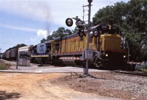 CSX Transportation | Pensacola, Florida | HLCX ex-UP GE C36-7m #578 and CSX B30-7 #5894 diesel-electric locomotives | westbound | June 18, 2002 | Dick Flock photograph